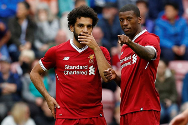 Dua bintang Liverpool, striker Mohamed Salah (kiri) dan bek Georginio Wijnaldum./Reuters