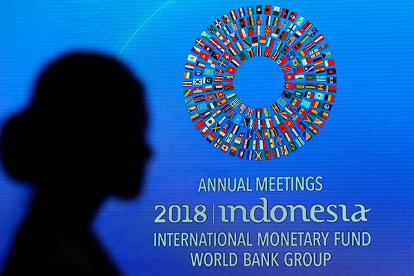 Peserta saat mengikuti salah satu acara dalam rangkaian Pertemuan IMF - World Bank Group 2018, di Nusa Dua, Bali, Jumat (12/10/2018)./Reuters-Johannes P. Christo