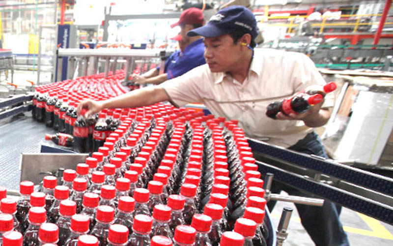 Proses produksi minuman soda dalam kemasan. /coca-colaamatil.co.id