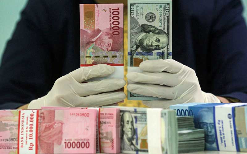  Rupiah Ditutup Turun, Pasar Cermati Upaya Pemerintah Pulihkan Ekonomi