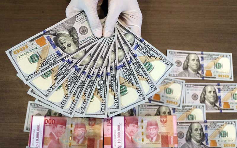  Ketegangan Ukraina Kian Membara, Euro Melemah, Dolar AS Landai
