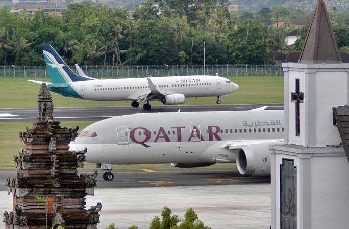 Pesawat udara berada di kawasan Bandara Internasional I Gusti Ngurah Rai, Bali, Jumat (8/3/2019)./ANTARA-Fikri Yusuf