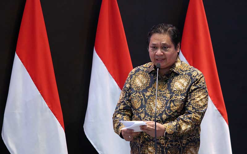 Menko Perekonomian Airlangga Hartarto memberikan sambutan saat pembukaan pembukaan perdagangan Bursa di BEI, Jakarta, Senin (3/1/2021). Bisnis