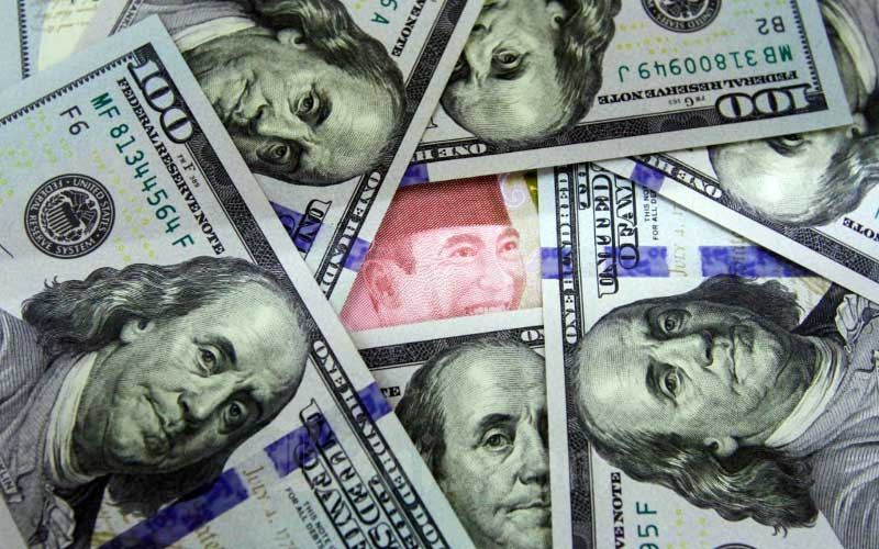  Rupiah Tertekan Dolar AS Jelang Keputusan Suku Bunga The Fed