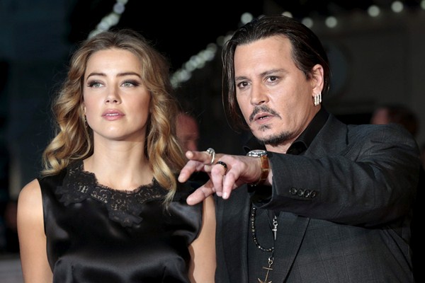 Amber Heard dan Johnny Depp/Reuters