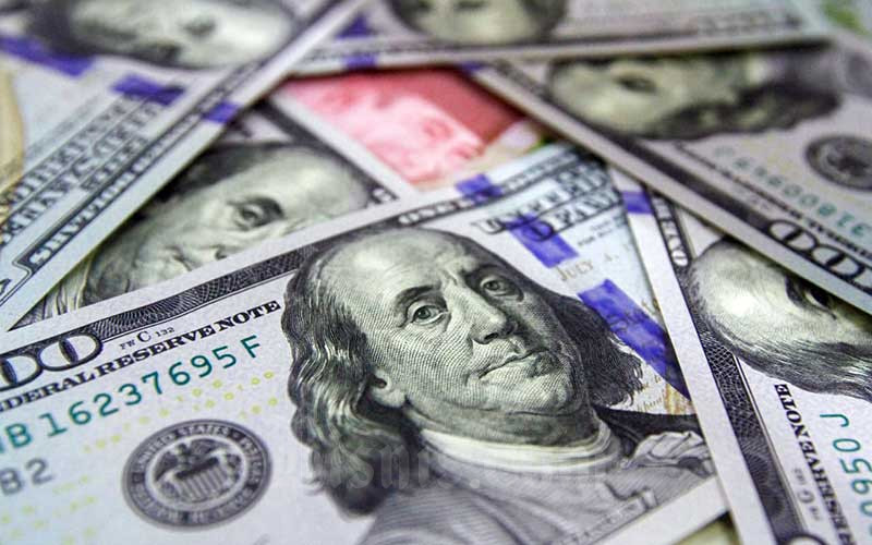  Rupiah Dibuka Berfluktuasi, The Fed Beri Angin Segar ke Dolar AS