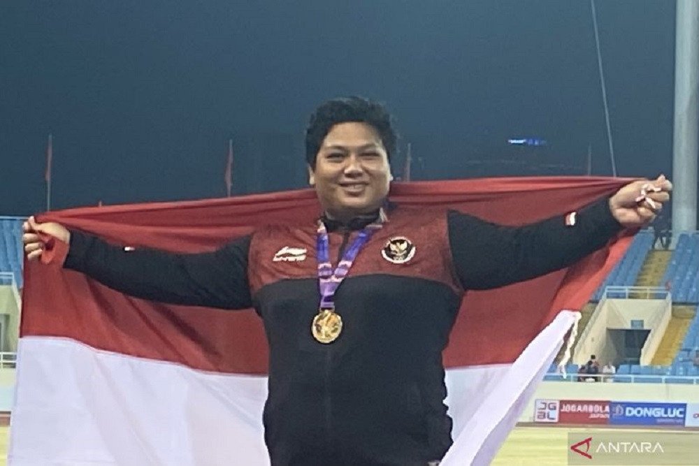 Selebrasi atlet tolak peluru Indonesia, Eki Febri Erawati, usai meraih medali emas di Sea Games 2021 / Antara