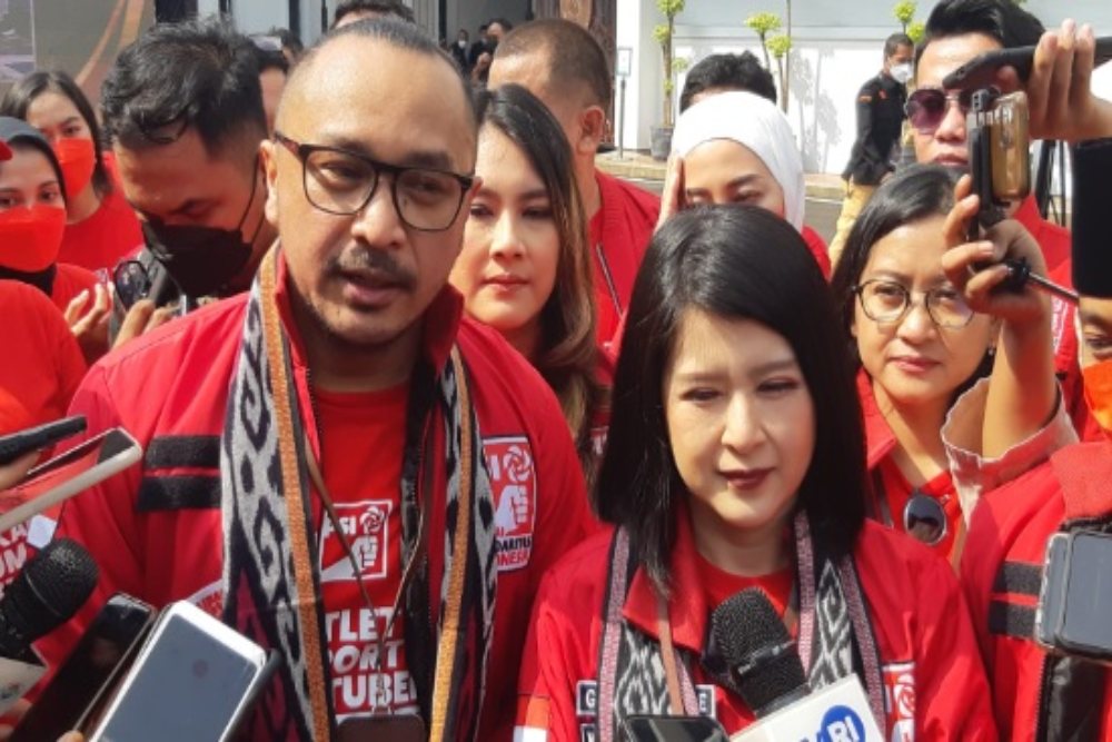 Ketua Umum Dewan Pimpinan Pusat (DPP) Partai Solidaritas Indonesia (PSI) Giring Ganesha (kiri) menyatakan siap 100 persen sebagai calon peserta Pemilu 2024, Rabu (10/8/2022). JIBI/Bisnis-Surya Dua Artha Simanjuntak