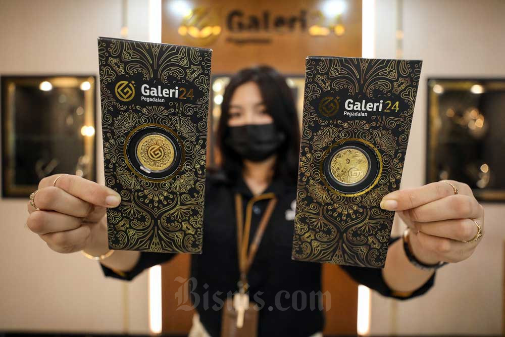  Harga Emas Terus Merosot Kena Tekan Suku Bunga dan Dolar AS