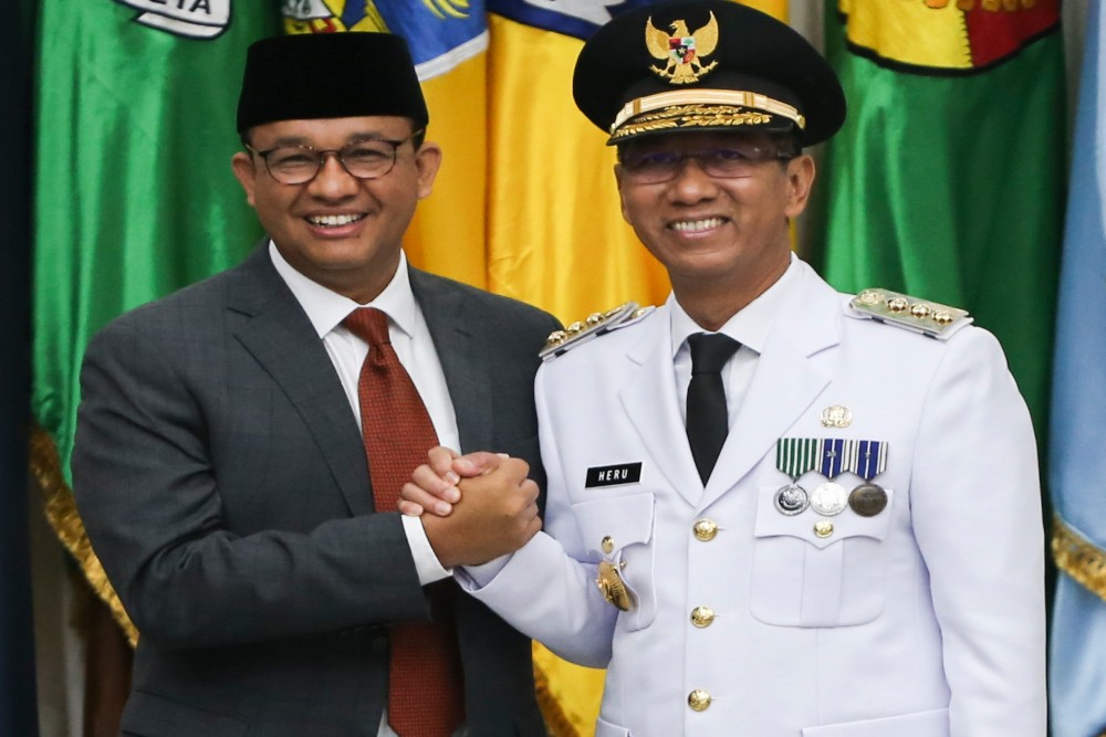  Beda Cara dan Gaya Heru Budi Vs Anies Baswedan Pimpin DKI Jakarta