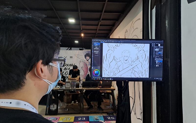 Kegiatan live drawing yang dilakukan Hive Studio dalam acara Seccon Festival 2.0 pada Sabtu (26/11/2022) di Galeri Industri Kreatif, Kota Lama Semarang./Bisnis-Muhammad Faisal Nur Ikhsan 