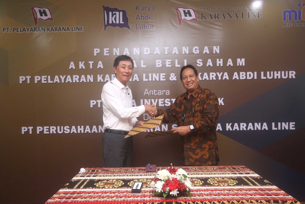 Mitra Investindo (MITI) melakukan penandatanganan Akta Jual Beli Saham dengan   untuk pengambilalihan saham PT Pelayaran Karana Line dan PT Karya Abadi Luhur/Dok.MITI. 