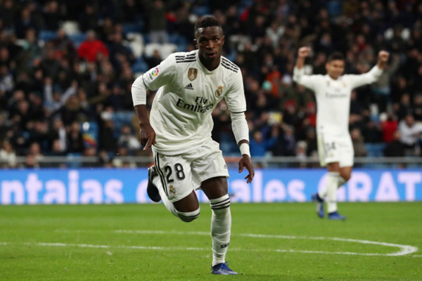 Striker Real Madrid Vinicius Junior. Hasil Liga Spanyol: Madrid Terus Tempel Barca Usai Bekuk Valencia/Reuters-Susana Vera