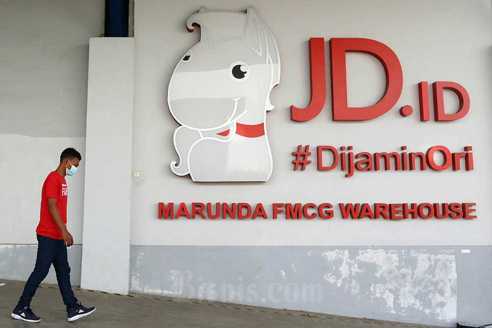 Aktivitas pekerja di Warehouse JD.ID Marunda, Bekasi, Jawa Barat, Jumat (11/12/2020). Bisnis/Eusebio Chrysnamurti