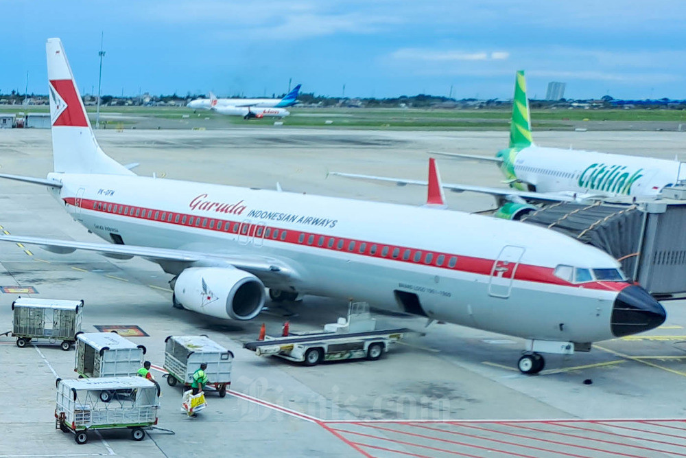 Pesawat maskapai Garuda Indonesia berada di Terminal 3 Bandara Soekarno Hatta, Tangerang, Selasa (20/12/2022). Bisnis/Himawan L Nugraha