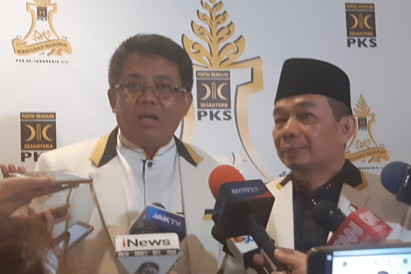 Presiden Partai Keadilan Sejahtera (PKS) Sohibul Iman bersama Ketua Fraksi DPR PKS Jazuli Juwaini./Bisnis-Jaffry Prabu Prakoso