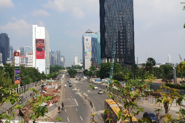 Suasana di kawasan Jalan Sudirman Jakarta, Minggu (17/6/2018).-JIBI/Mutiara Nabila. Bappenas Sebut Pertumbuhan Ekonomi Tembus 5,5 Persen di 2023, Syaratnya?
