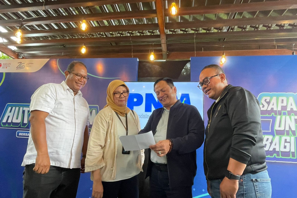 Direktur Utama PNM Arief Mulyadi dalam acara Pra HUT PT PNM Ke-24 di Menara PNM, Jakarta — Bisnis/Rika Anggraeni