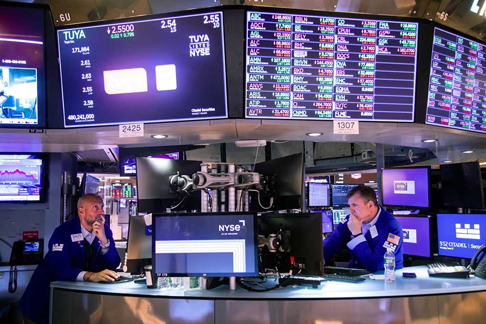 Wall Street naik di tengah kewaspadaan investor menunggu data inflasi dan pertemuan kebijakan moneter Federal Reserve (The Fed). Bloomberg/Michael Nagle
