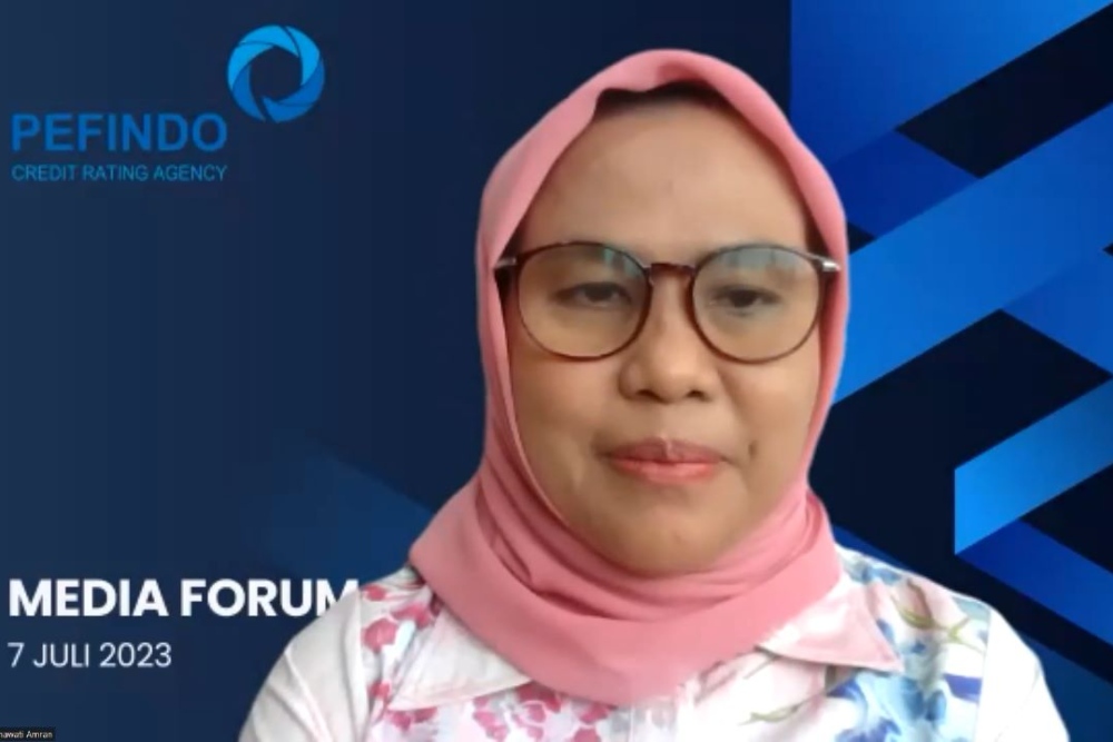 Direktur Utama PT Pemeringkat Efek Indonesia (Pefindo) Irmawati dalam konferensi pers secara daring, Jumat (7/7/2023). Pefindo telah menerima mandat pemeringkatan surat utang (obligasi) korporasi yang akan terbit dengan nilai Rp61,30 triliun per Juni 2023.