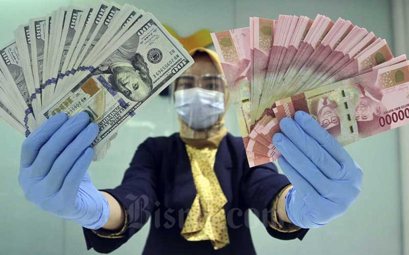  Rupiah Dibuka Tangguh Rp14.965 Berkat Inflasi AS Melambat