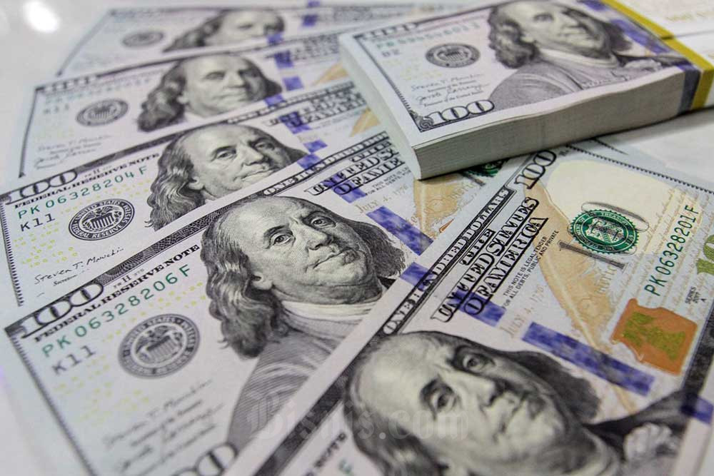 Rencana The Fed mengerek suku bunga lanjutan menguatkan dolar AS dan kemudian menekan rupiah. Bisnis/Fanny Kusumawardhani