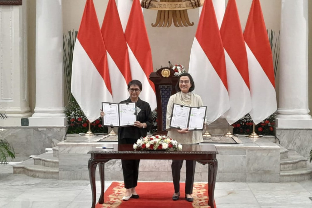  Menlu Retno dan Menkeu Sri Mulyani Teken MoU  Kerja Sana Mendorong UMKM Go Global