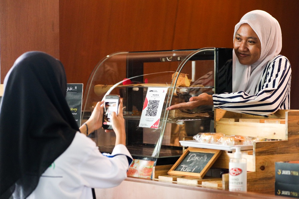  LAYANAN QRIS : Jumlah Pengguna dan Nilai Transaksi Melesat