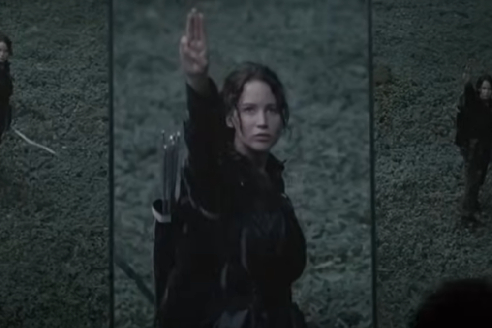  Arti Three Finger Salute dalam The Hunger Games yang Kini Digunakan oleh Ganjar