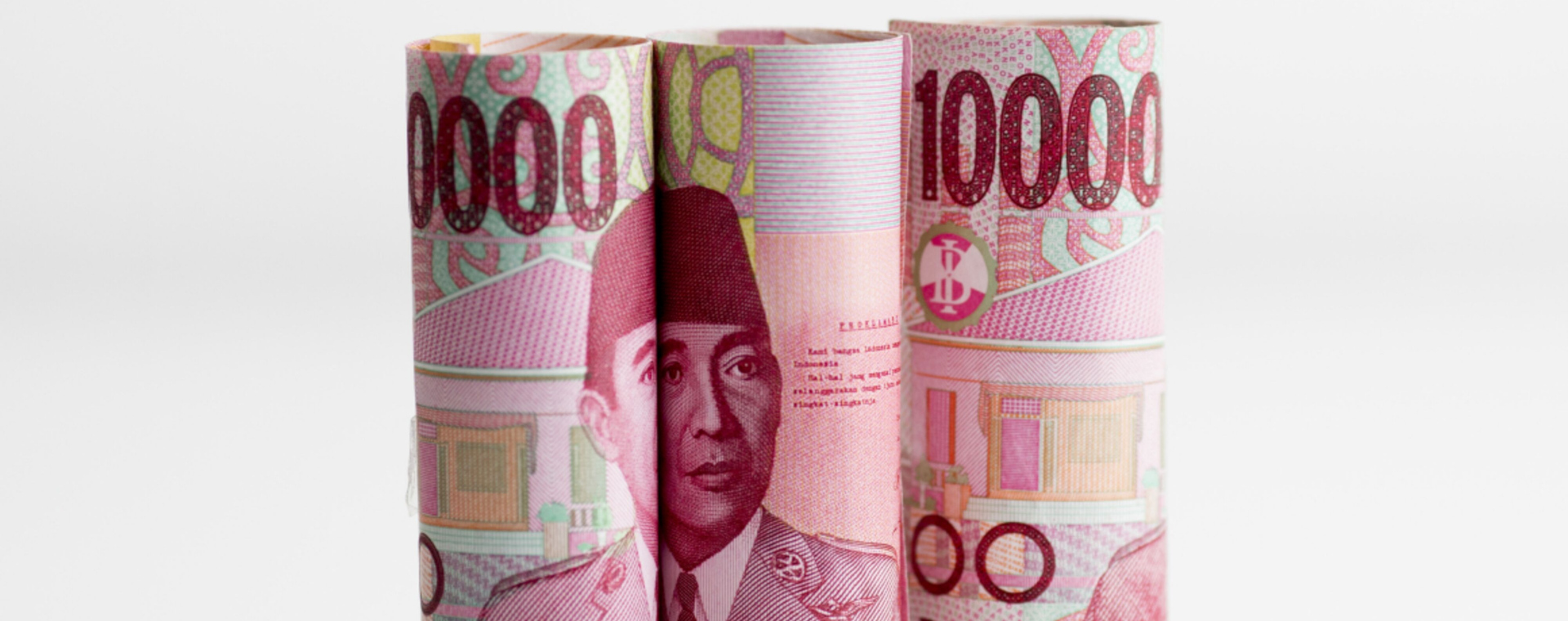  Rupiah Ditutup Lesu setelah BI Tahan Suku Bunga Acuan 2 Bulan Beruntun