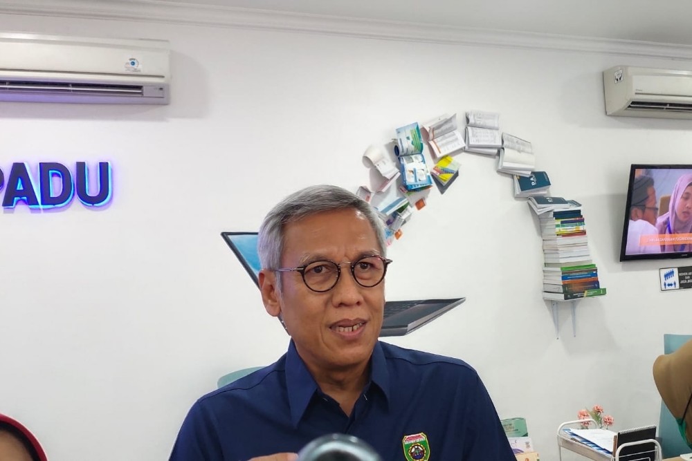 Kepala Dinas Pertanian Tanaman Pangan dan Hortikultura Sumatra Selatan Bambang Pramono saat memberikan keterangan di Kantor BPS, Palembang, Kamis (1/1/2024). /Bisnis-Husnul