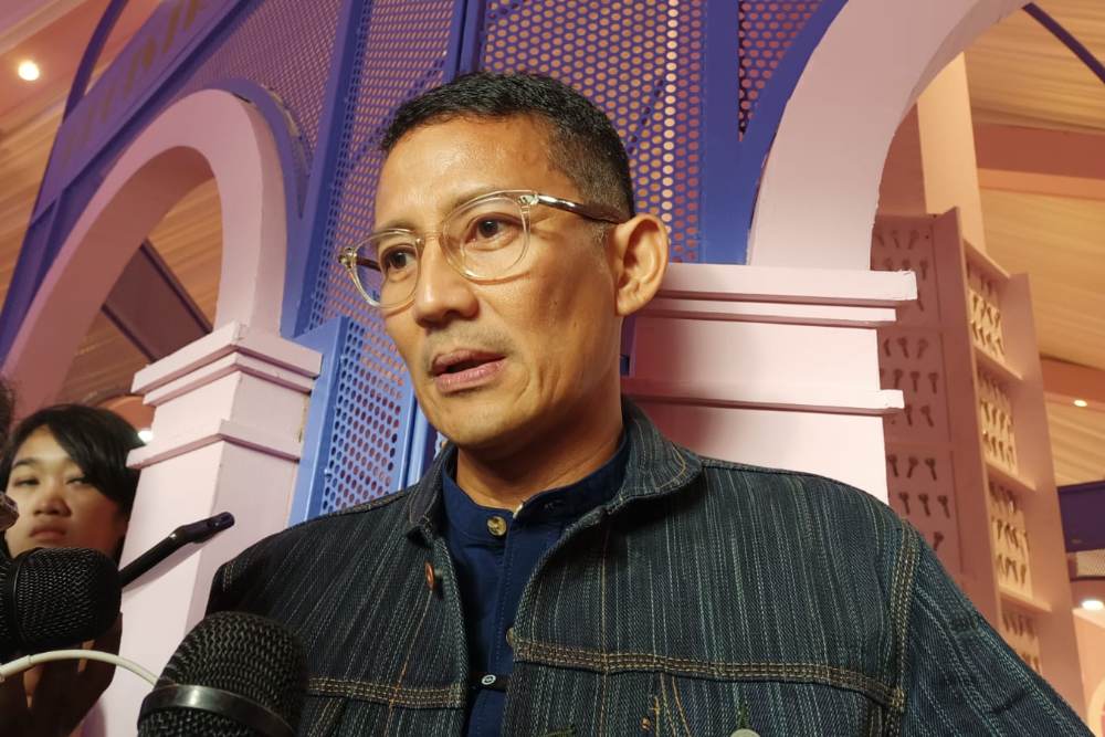 Menteri Pariwisata dan Ekonomi Kreatif (Menparekraf) Sandiaga Uno saat ditemui di Jakarta, Kamis (30/11/2023). / BISNIS-Ni Luh Anggela