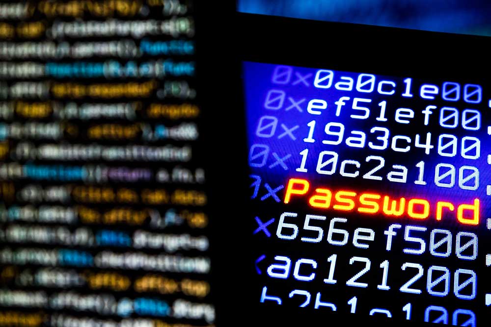 Kode komputer dan teks ditampilkan di layar komputer. Bloomberg/Chris Ratcliffe