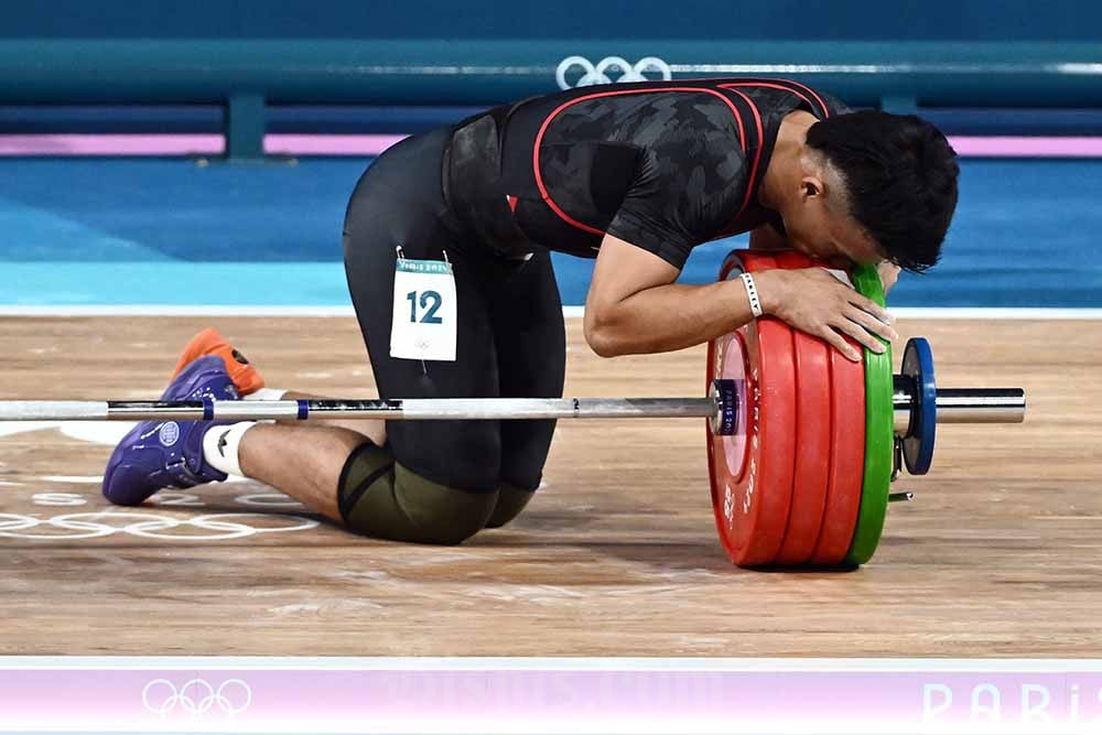  Rizki Juniansyah Catat Rekor Olimpiade Angkat Berat