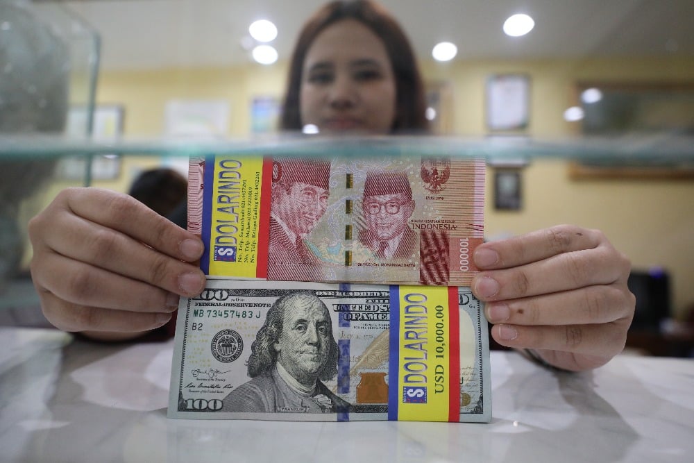  Rupiah Ditutup Melemah Ke Level Rp15.686,5