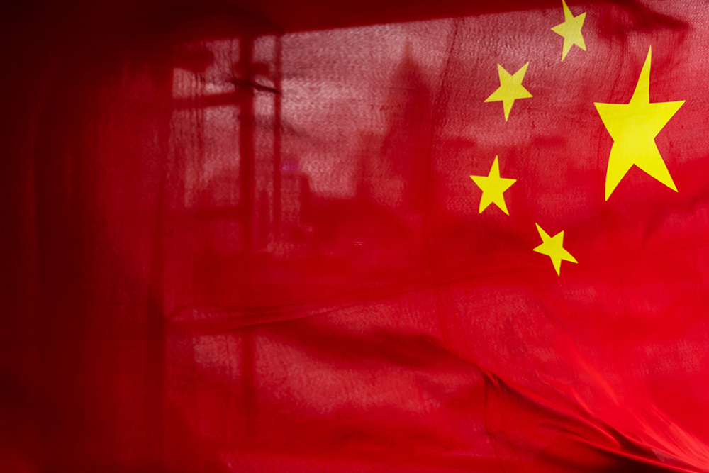 Bendera China. Bloomberg/Paul Yeung
