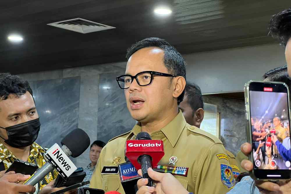 Wakil Menteri Dalam Negeri (Wamendagri) Bima Arya seusai rapat dengar pendapat (RDP) Kemendagri, Pj Gubernur, dan Pj Bupati/Wali Kota dengan Komisi II DPR, di Gedung DPR, Kompleks Parlemen Senayan, Jakarta Pusat, pada Senin (11/11/2024)/Bisnis-Annisa Nurul Amara