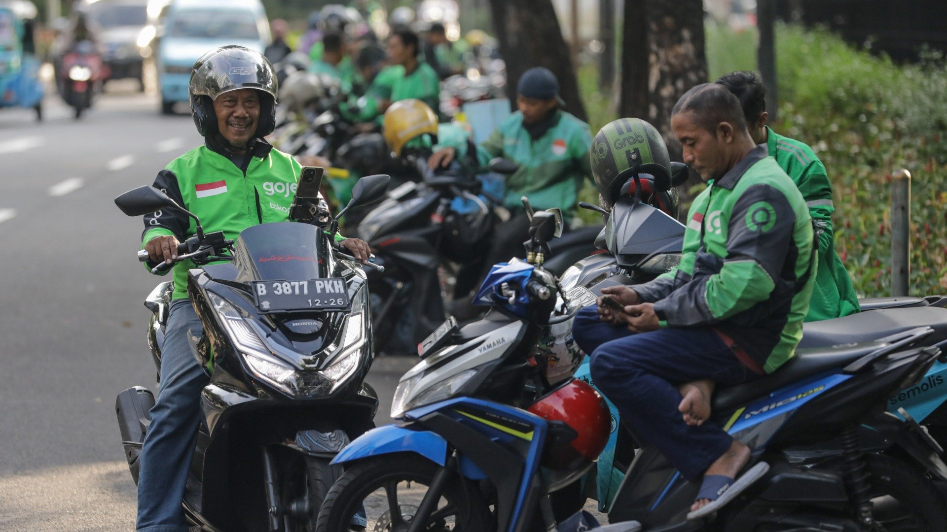  Grab Cetak Laba, Gojek Tokopedia (GOTO) Kapan?