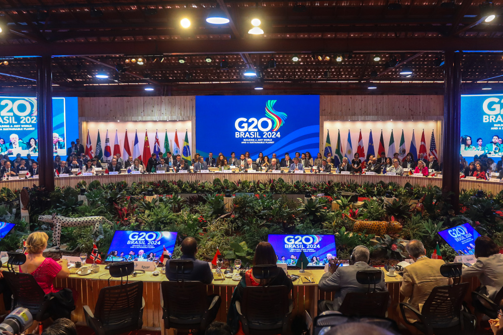 Audiens mendengarkan paparan Presiden Brasil Luiz Inacio Lula da Silva dalam Pertemuan Menteri Keuangan dan Gubernur Bank Sentral (Finance Ministers and Central Bank Governors Meeting/FMCBG) G20 di Rio de Janeiro, Brasil pada Rabu (24/7/2024). / Bloomberg-Dado Galdieri
