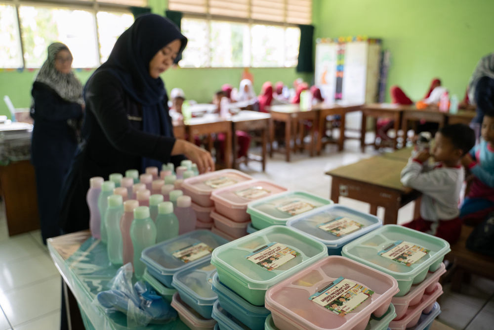  GOTO - Grab di Program MBG, Beda Cara Pemesanan Makanan