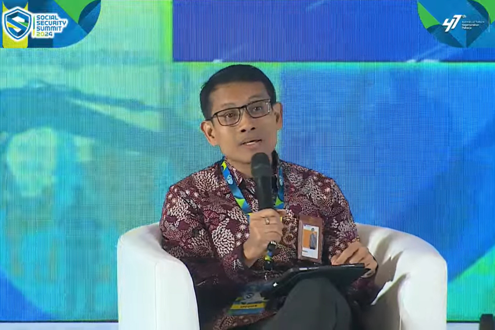 Staf Ahli Bidang Pengeluaran Negara Kementerian Keuangan (Kemenkeu) Sudarto memberikan paparan dalam acara Social Security Summit 2024 di Jakarta, Selasa (26/11/2024). / dok. BPJS Ketenagakerjaan