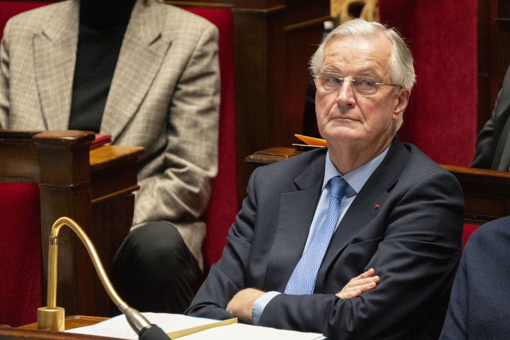 Perdana Menteri Prancis Michel Barnier dalam debat mosi tidak percaya di Majelis Nasional, Paris, Prancis pada Rabu (4/12/2024). / Bloomberg-Nathan Laine