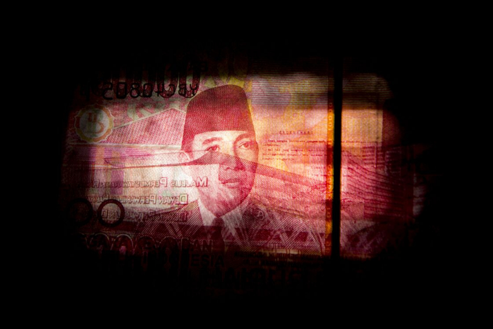 Potret Presiden Pertama RI Sukarno dalam uang lembar rupiah pecahan Rp100.000./Bloomberg-Brent Lewin