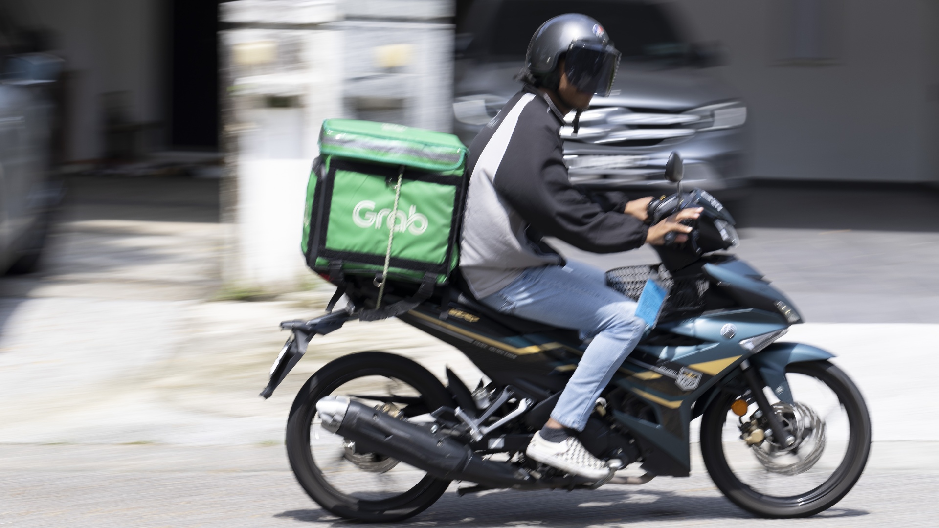 Laju Saham Grab Ungguli Rival Gojek (GOTO) di Asia Tenggara