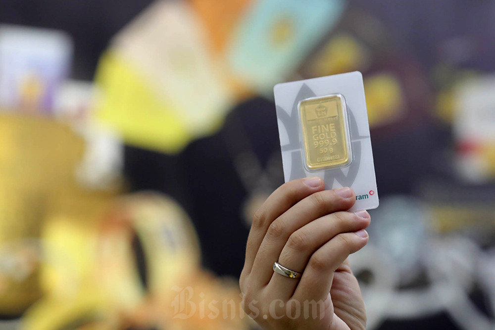 Harga emas Antam terpantau diskon pada perdagangan hari pertama tahun baru 2025, Rabu (1/1/2025). Emas batangan Antam ukuran 1 gram kini dibanderol Rp1.553.000.Bisnis/Himawan L Nugraha