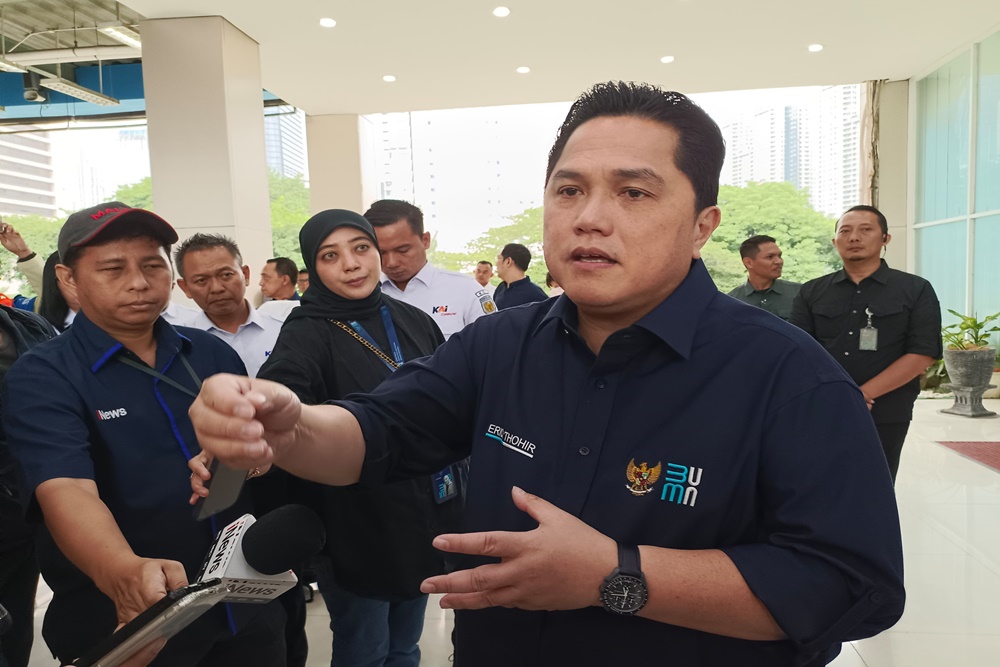 Erick Thohir bicara merger Garuda ke Injourney saat ke Bandara Soetta/Bisnis.Rizqi Rajendra