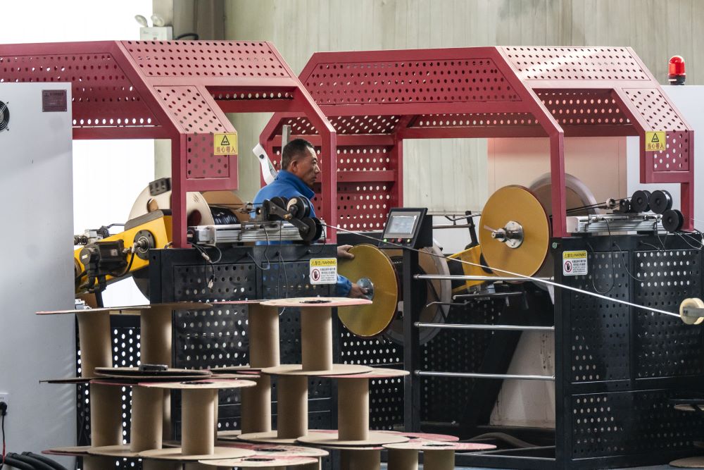 Aktivitas salah satu pabrik di China./Bloomberg-Qilai Shen