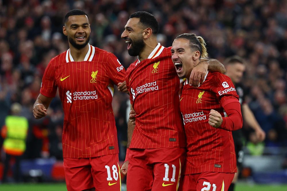 Pemain Liverpool Mohamed Salah, Cody Gakpo, Kostas Tsimikas /Reuters-Lee Smith