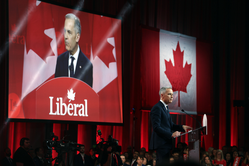 Pemimpin Partai Liberal Kanada Mark Carney berpidato dalam pengumuman pemimpin partai tersebut di Ontario, Kanada pada Minggu (9/3/2025) waktu setempat. / Bloomberg-David Kawai
