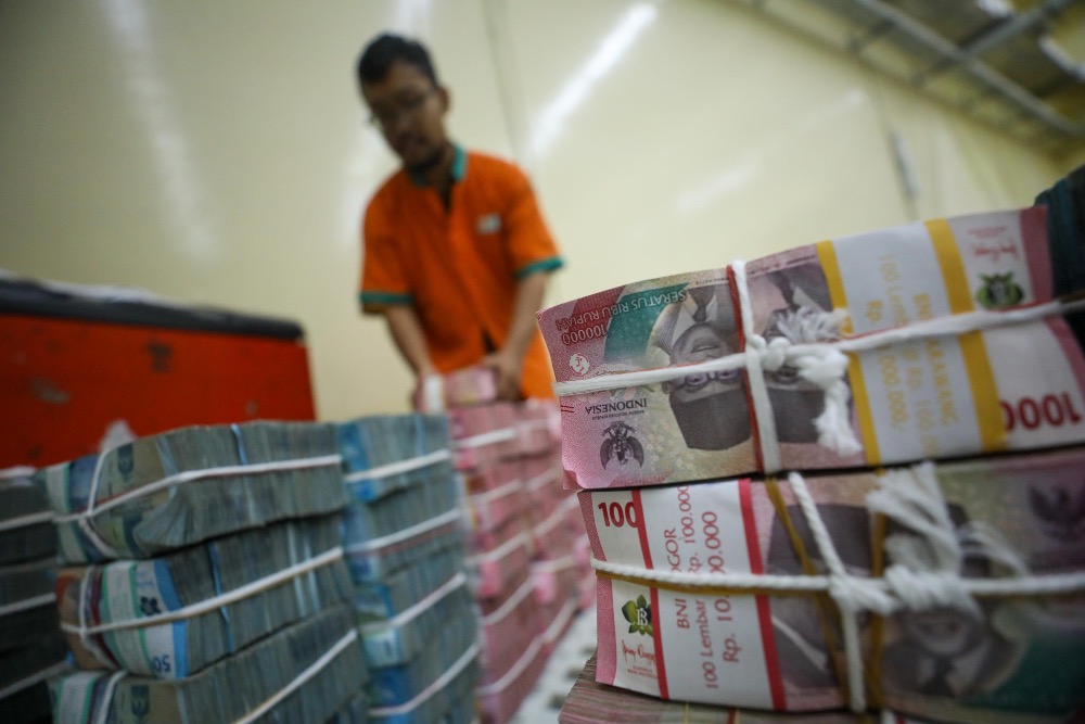  Rupiah Ditutup Melemah ke Rp16.855 per Dolar AS